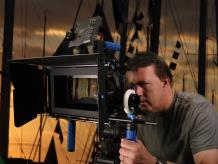 David Duncan, owner of Camelot Studios filming at boatnight in Port Huron, MI